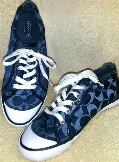 navy blue coach shoes.